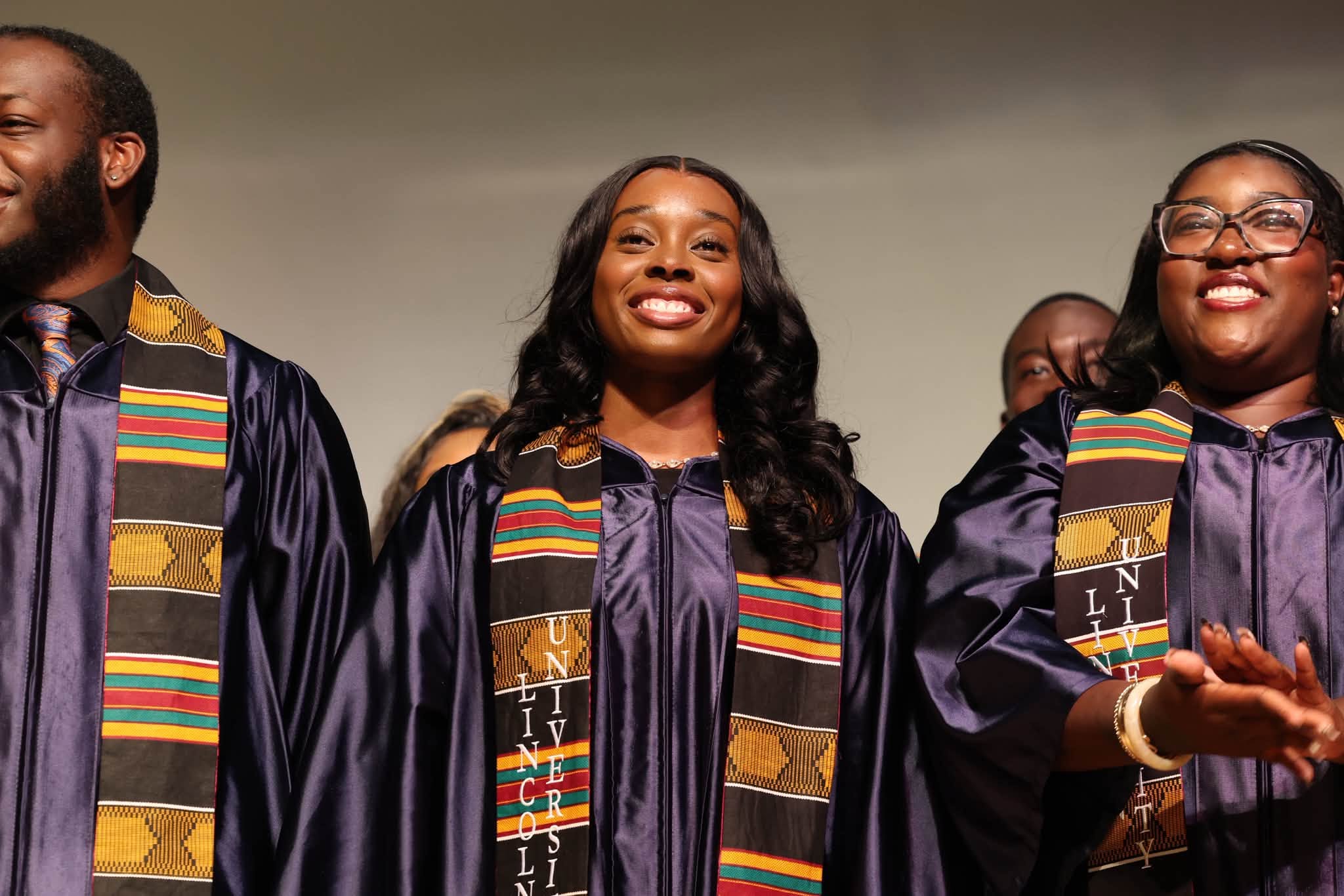 Lincoln University student smiling at student government installation ceremony. 