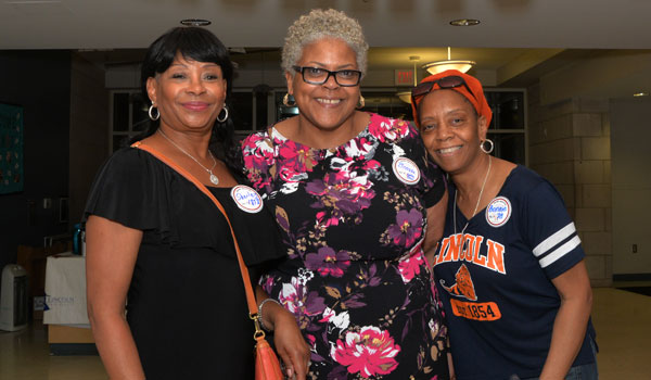 three women smiling