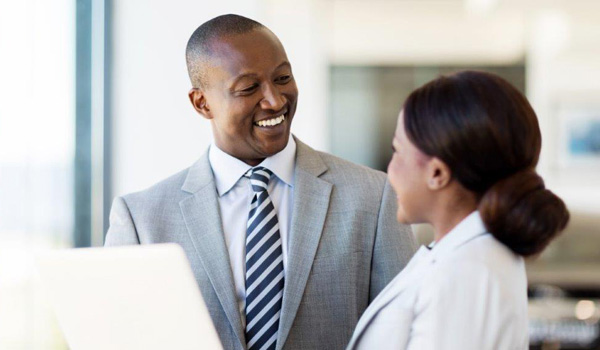 photo of a man and woman talking