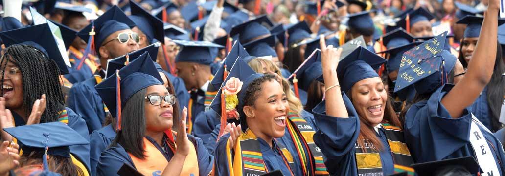 Group of students excited at graduation