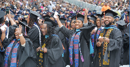 students celebrating graduation
