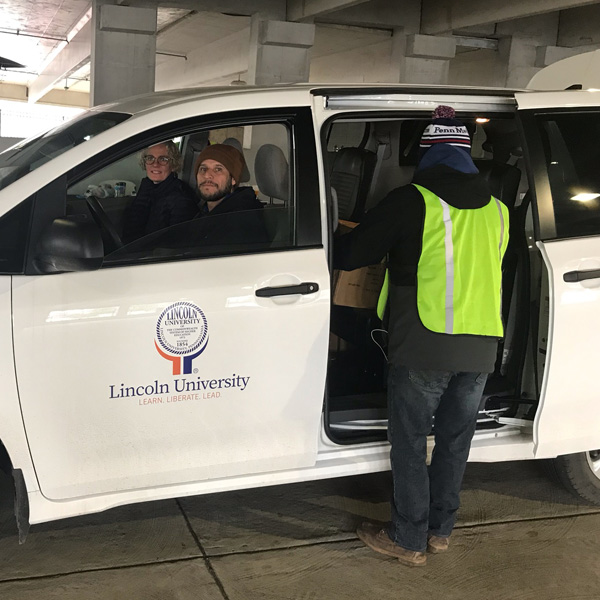 Tarcisio Delgado of Aramark and Dr. Anna Hull deliver personal protective equipment to Chester County Hospital and Penn Medicine on March 24, 2020./ courtesy photo