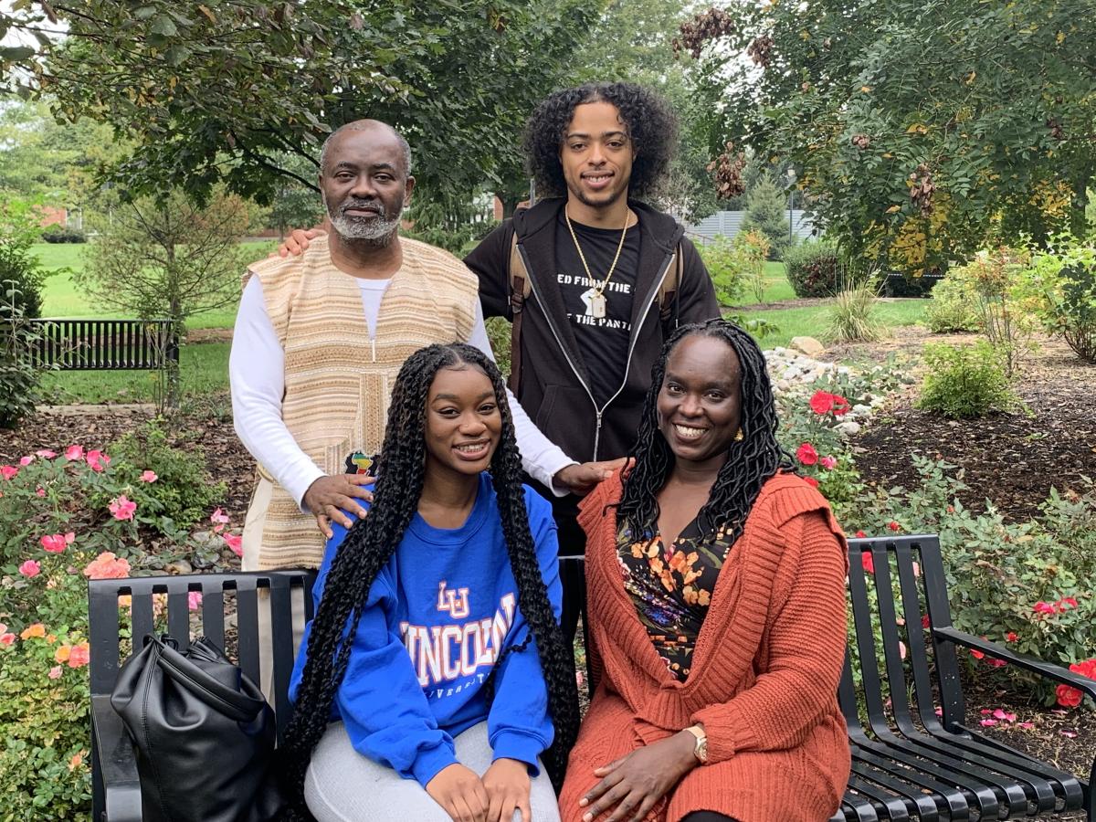 Standing: Dr. Gervais Gnaka Lagoke, assistant professor of history; Chamir James ‘22; seated: Romika-Grace Volcy ‘23; Dr. Dafina Diabate, director of international programs