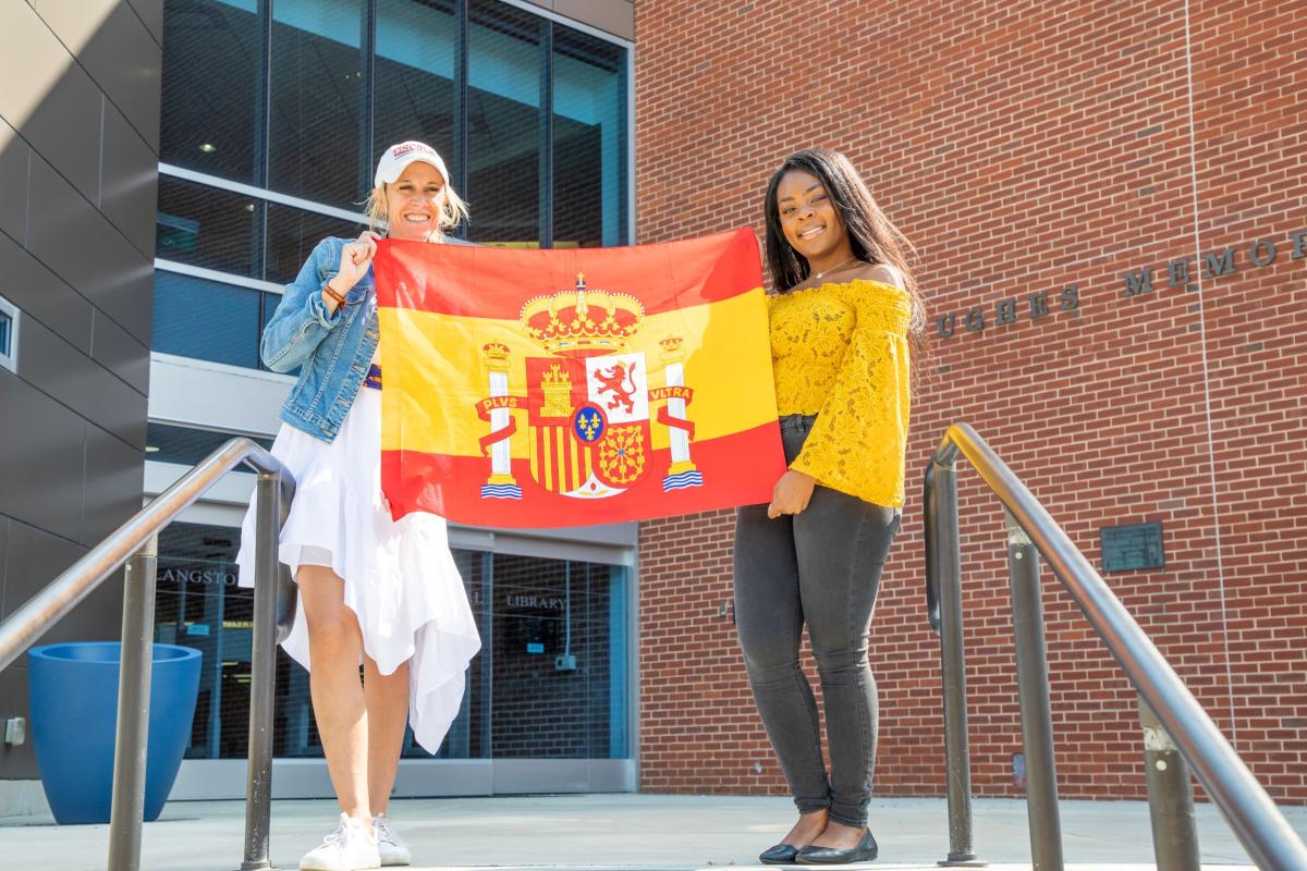 Students holding flag