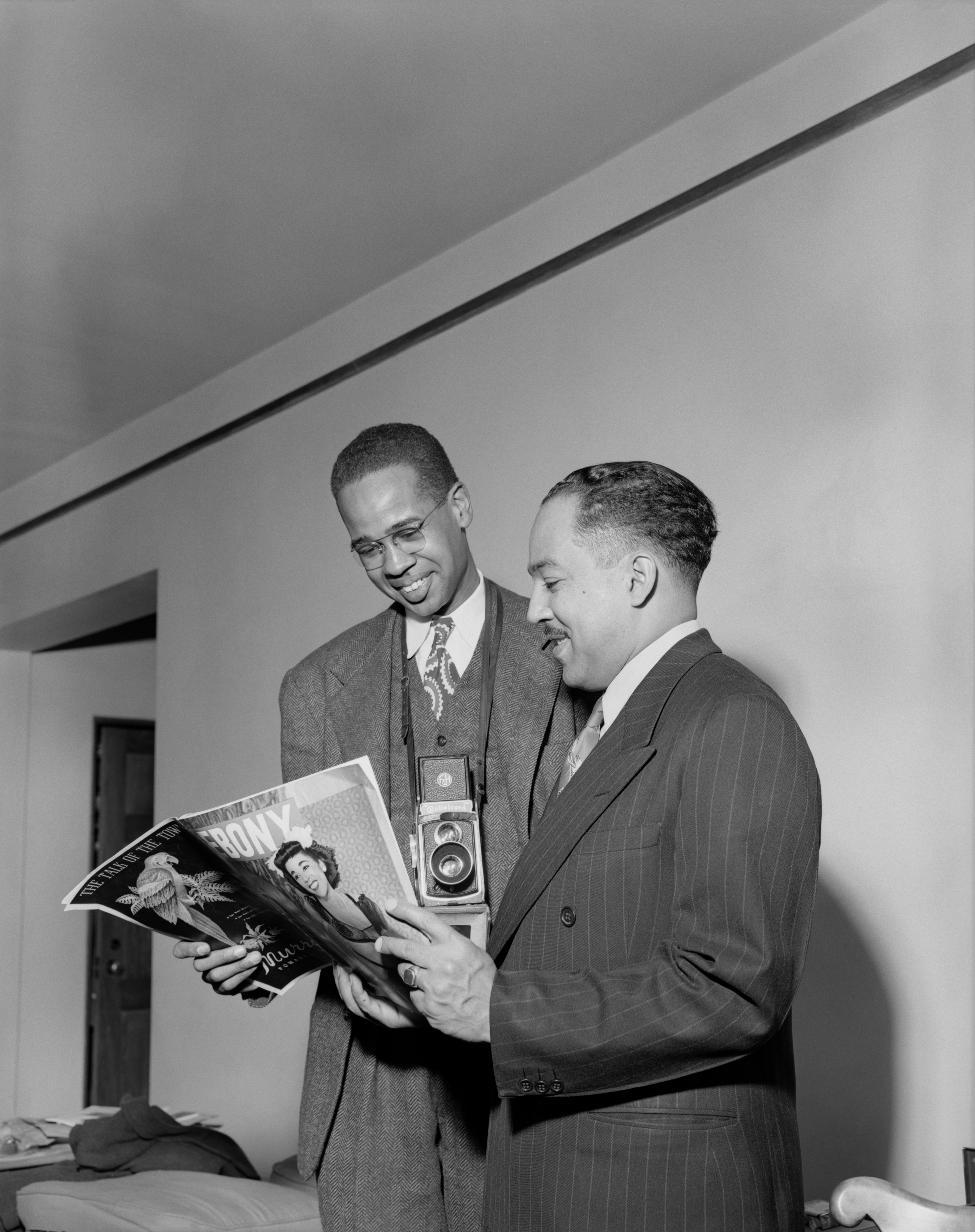 Credits: Photo by Griff Davis, Griff Davis and Langston Hughes read Ebony Magazine, 1947, courtesy of Griffith J. Davis Photographs and Archives