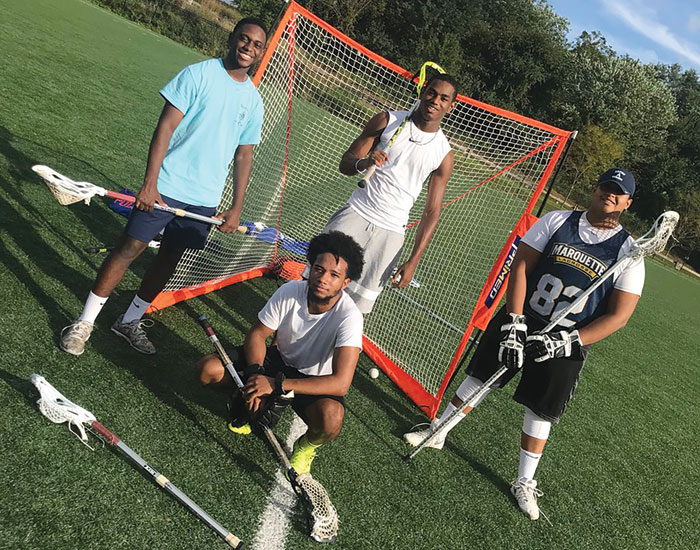 Four Lacrosse Club Team Members