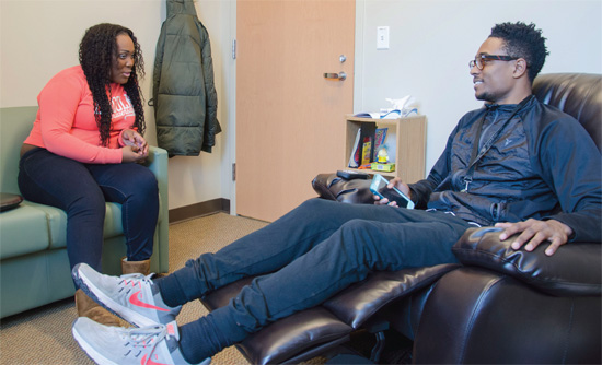 Two People sitting in the Relaxation Room